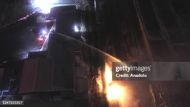 Smoke and flames rise after after the train derailment in East Palestine, Ohio, United States on February 17, 2023. The train derailment happened on...