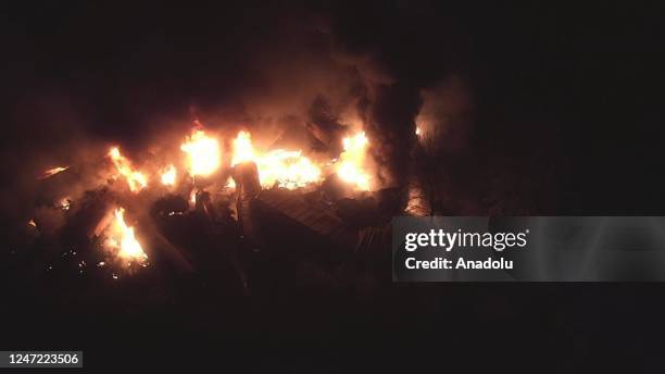 Smoke and flames rise after after the train derailment in East Palestine, Ohio, United States on February 17, 2023. The train derailment happened on...