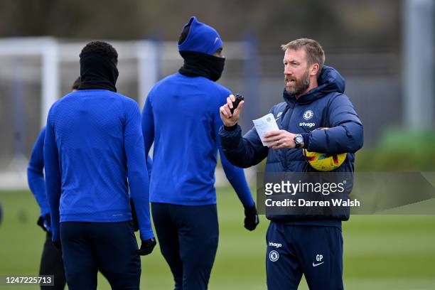 Head Coach Graham Potter of Chelsea during a training session at Chelsea Training Ground on February 17, 2023 in Cobham, England.