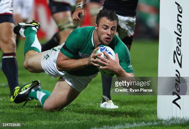 Tommy Bowe of Ireland goes over to score a try during the IRB 2011 Rugby World Cup Pool C match between Ireland and the USA on September 11, 2011 in...