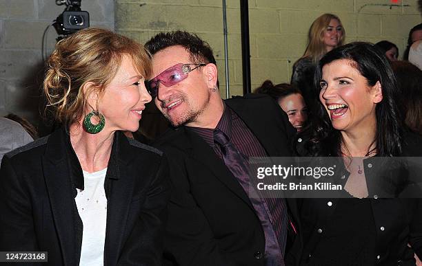 Trudie Styler, Bono, and Alison Hewson attend the Edun Spring 2012 fashion show during Mercedes-Benz Fashion Week at 330 West Street on September 11,...