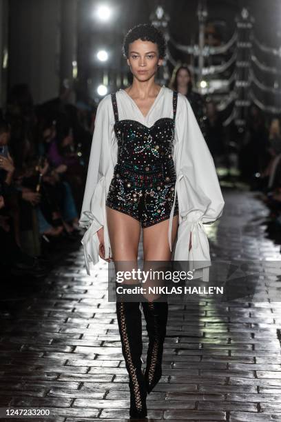 Model presents a creation during the Annie's Ibiza debut Collection catwalk show for their Autumn/Winter 2023 collection on the opening day of the...