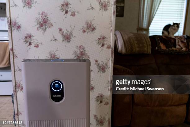 An air filter runs in a living room on February 17, 2023 in Darlington, Pennsylvania. Many residents living in Pennsylvania claim that no air quality...