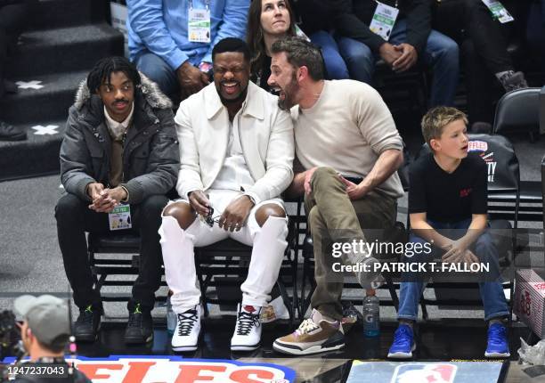 Actors Ben Affleck and his son Samuel Garner Affleck with Chris Tucker and his son Destin Christopher Tucker attend the 2023 Ruffles All-Star...