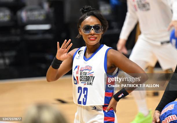 Singer-songwriter Janelle Monae waves as she attends the 2023 Ruffles All-Star Celebrity Game during NBA All-Star Weekend in Salt Lake City, Utah,...