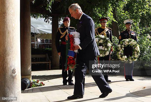 Prince Charles, Prince of Wales lays a wreath as he attends the tenth anniversary ceremony of victims of the attacks on the World Trade Centre in New...