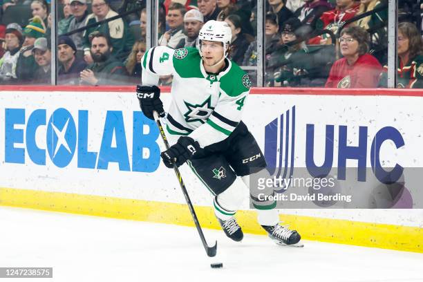 Miro Heiskanen of the Dallas Stars skates with the puck against the Minnesota Wild in the first period of the game at Xcel Energy Center on February...