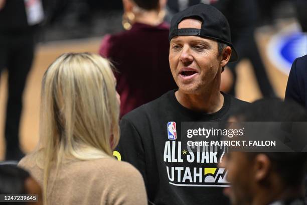 Ryan Smith owner of the Utah Jazz talks with Assistant coach Lindsey Vonn of Team Dwayne during the NBA Ruffles All-Star Celebrity Game on February...