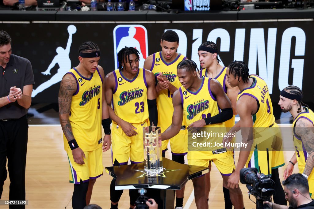 Spring Stars Game Team Pau receive the trophy for winning the Jordan Rising Stars Game ...