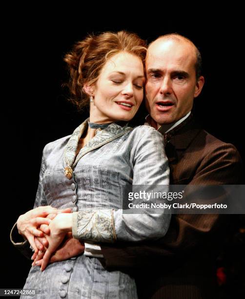 Actors Catherine McCormack and Finbar Lynch in a dress rehearsal for an adaptation of Henrik Ibsen's "A Doll's House" directed by Sir Peter Hall at...