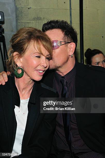 Trudie Styler and Bono attend the Edun Spring 2012 fashion show during Mercedes-Benz Fashion Week at 330 West Street on September 11, 2011 in New...