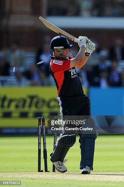 Jonathan Trott of England is bowled by Praveen Kumar of India during the 4th Natwest One Day International match between England and India at Lord's...