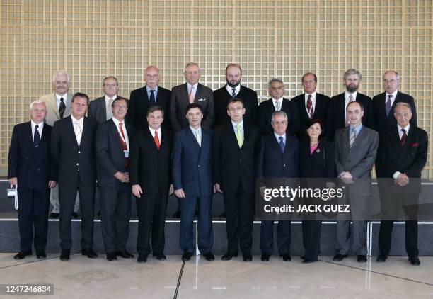 French Industry junior minister Patrick Devedjian poses with European energy ministers, 02 May 2005 in Paris, during a meeting organised to talk...