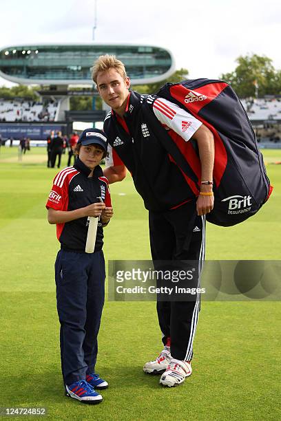 Stuart Broad of England poses for a photograph with the Brit Insurance mascot Rafferty Burrowe before the 4th Natwest One Day International match...