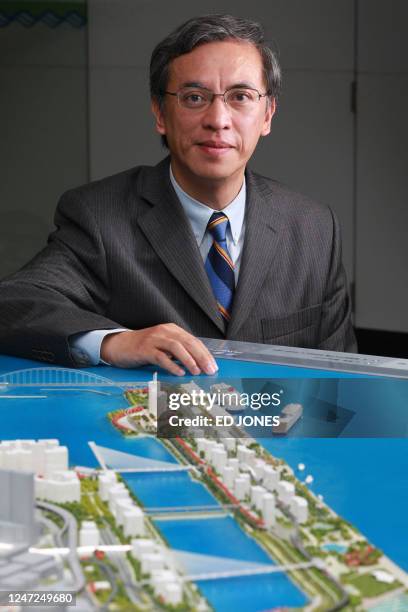 HongKong-property-land-KaiTak,FEATURE by Adrian Addison This photo taken on August 13, 2009 shows Kowloon district planning officer Eric Yue posing...