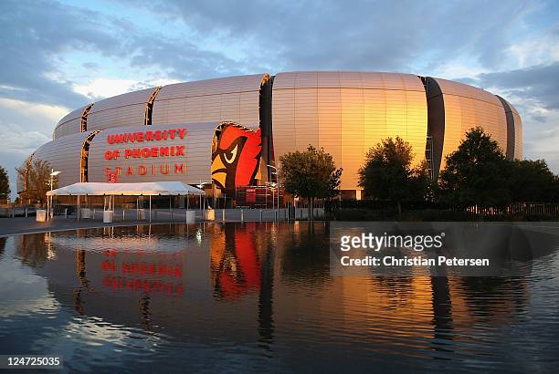 General view of the University of Phoenix Stadium as the sun sets following the NFL season opener game between the Carolina Panthers and the Arizona...