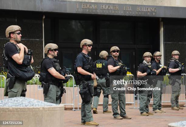 Officers stand guard at the J. Edgar Hoover Building during a protest against police brutality and racism on June 6, 2020 in Washington, DC. This is...