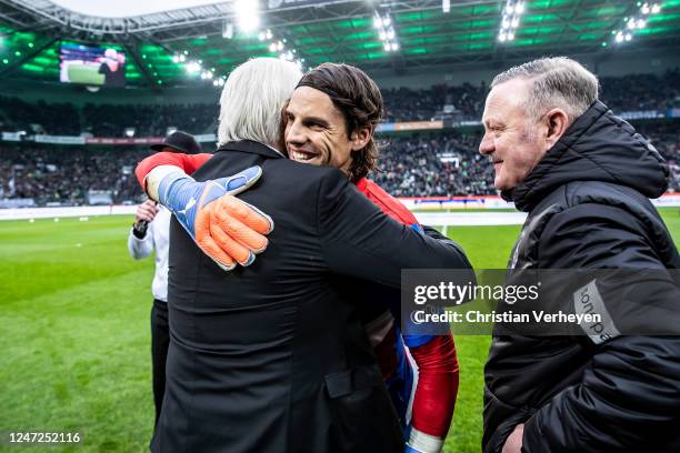 Rainer Bonhof of Borussia Moenchengladbach hugs Yann Sommer of FC Bayern Muenchen at his farewell from Borussia Moenchengladbach ahead of the...