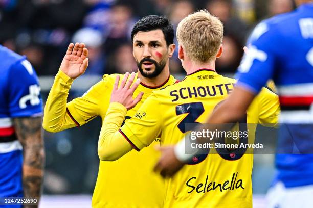 Roberto Soriano of Bologna celebrates with his team-mate Jerdy Schouten after scoring a goal during the Serie A match between UC Sampdoria and...