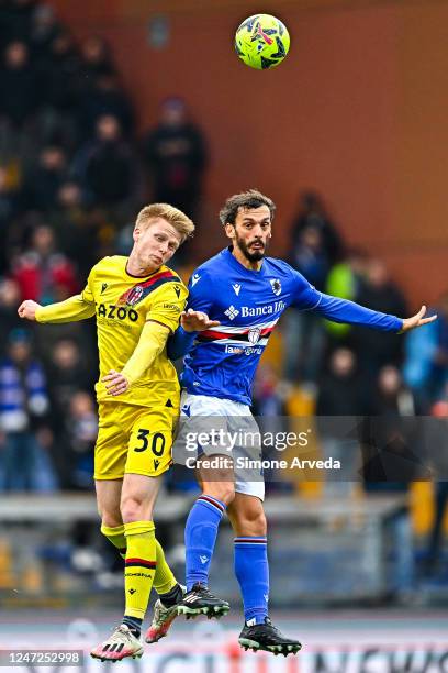 Jerdy Schouten of Bologna and Manolo Gabbiadini of Sampdoria vie for the ball during the Serie A match between UC Sampdoria and Bologna FC at Stadio...