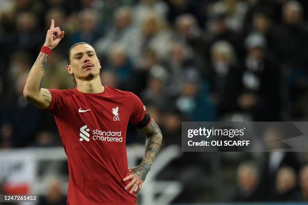 Liverpool's Uruguayan striker Darwin Nunez celebrates after scoring his team first goal during the English Premier League football match between...