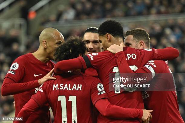 Liverpool's Dutch striker Cody Gakpo celebrates after scoring his team second goal during the English Premier League football match between Newcastle...