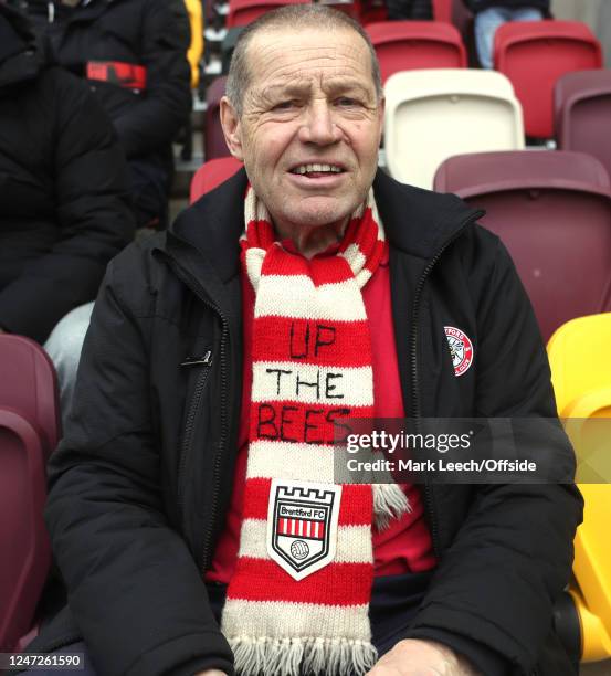 A Brentford supporter wearing his treasured forty year old scarf during the Premier League match between Brentford FC and Crystal Palace at Gtech...