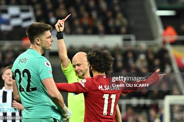 Newcastle United's English goalkeeper Nick Pope reacts after receiving a red card during the English Premier League football match between Newcastle...