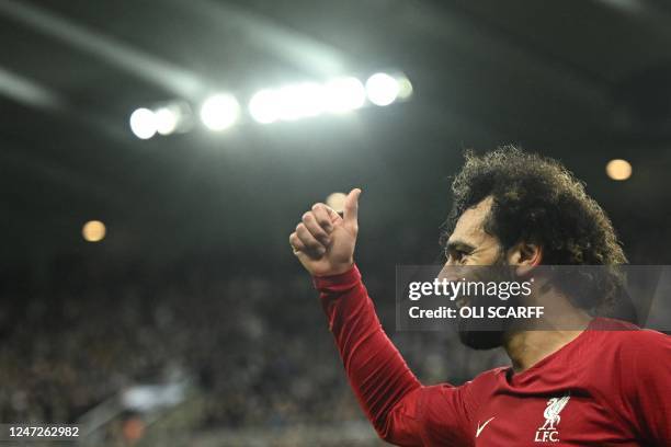 Liverpool's Egyptian striker Mohamed Salah reacts during the English Premier League football match between Newcastle United and Liverpool at St...