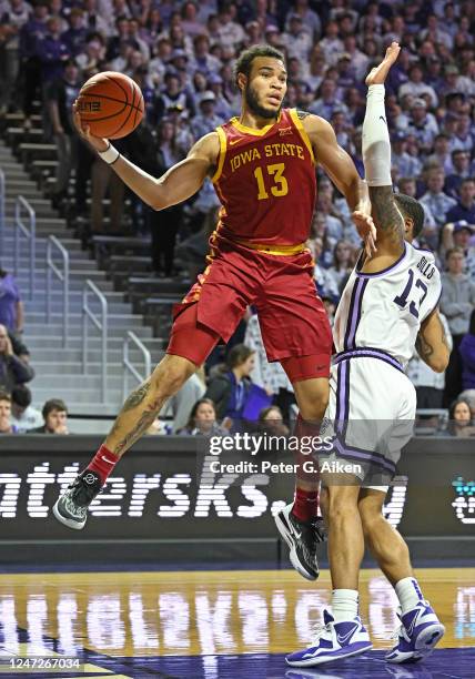 Jaren Holmes of the Iowa State Cyclones drives past Desi Sills of the Kansas State Wildcats in the first half of the game at Bramlage Coliseum on...