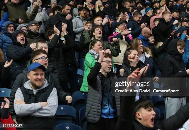 Blackburn Rovers fans celebrate after Daniel Ayala's 89th minute header clinched all three points during the Sky Bet Championship between Blackburn...