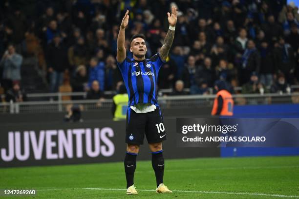 Inter Milan's Argentinian forward Lautaro Martinez reacts after scoring his team's third goal during the Italian Serie A football match between Inter...