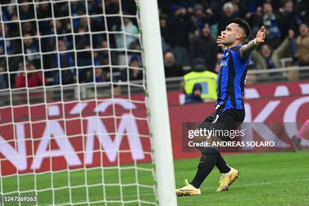 Inter Milan's Argentinian forward Lautaro Martinez celebrates scoring his team's third goal during the Italian Serie A football match between Inter...