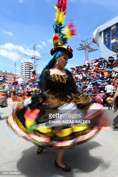 Dancers of the Waca Waca San Agustin group perform during the Oruro Carnival in Oruro, Bolivia on February 18, 2023. - Hundreds of street parties...