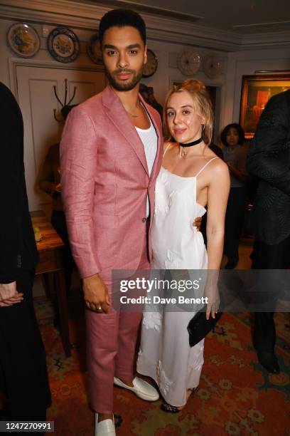 Rege-Jean Page and Emily Brown attend The Charles Finch & CHANEL 2023 Pre-BAFTA Party at 5 Hertford Street on February 18, 2023 in London, England.