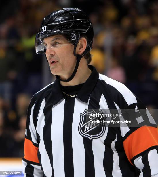 Referee Wes McCauley is shown during the NHL game between the Nashville Predators and Florida Panthers, held on February 18 at Bridgestone Arena in...