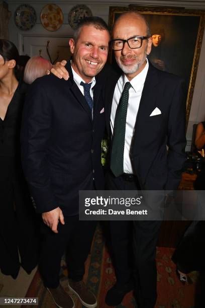 Nick Love and Eric Fellner attend The Charles Finch & CHANEL 2023 Pre-BAFTA Party at 5 Hertford Street on February 18, 2023 in London, England.