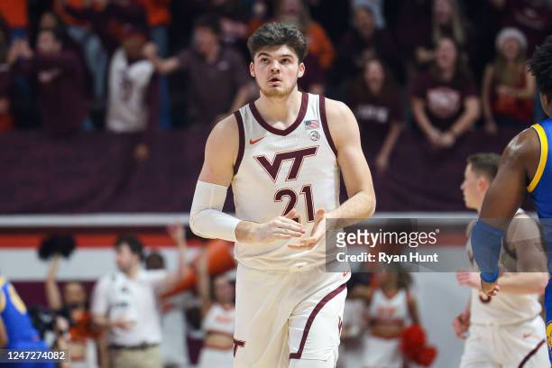 Grant Basile of the Virginia Tech Hokies reacts in the first half of a game against the Pittsburgh Panthers at Cassell Coliseum on February 18, 2023...