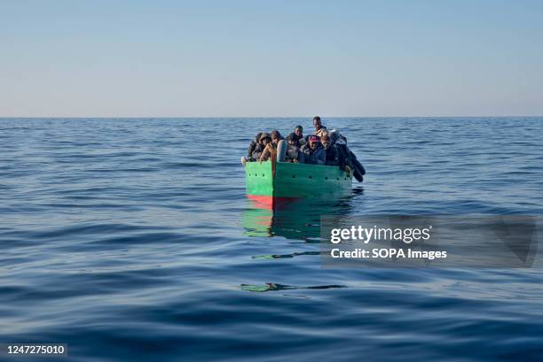 Boat with 31 migrants seen minutes seen before they were brought to safety by the Spanish NGO Salvamento Maritimo humanitarian rescue team in SAR...