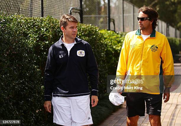 Austalian Davis Cup captain Pat Rafter and Tennis Australia's head of professional tennis Todd Woodbridge walk to speak to the media after an...