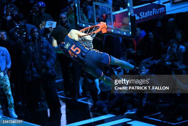 Basketball player Jericho Sims, of the New York Knicks, competes during the Slam Dunk Contest of the NBA All-Star week-end in Salt Lake City, Utah,...