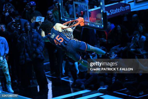 Basketball player Jericho Sims, of the New York Knicks, competes during the Slam Dunk Contest of the NBA All-Star week-end in Salt Lake City, Utah,...