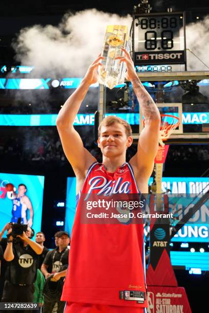 Mac McClung of the Philadelphia 76ers receives the AT&T Slam Dunk Contest Trophy as part of 2023 NBA All Star Weekend on Saturday, February 18, 2023...