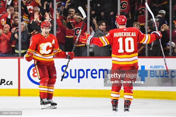 Mikael Backlund of the Calgary Flames celebrates after scoring the game-winning goal against the New York Rangers during the overtime period of an...