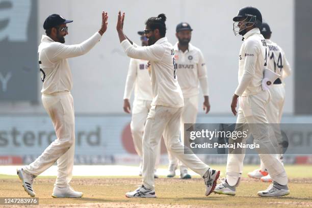 Ravindra Jadeja of India celebrates the wicket of Matt Kuhnemann of Australia during day three of the Second Test match in the series between India...