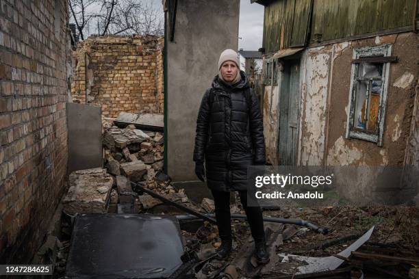 Volunteers restore Ina's house after being destroyed by a shelling in Irpin, Ukraine on February 18, 2023. Dobrobat is an organization that was born...