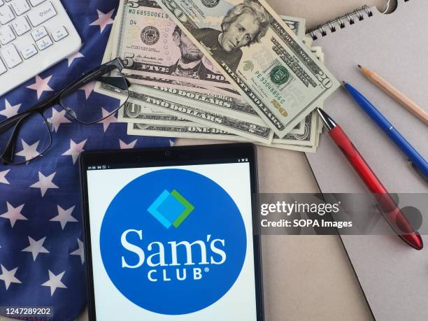 In this photo illustration, Sams Club logo seen displayed on a tablet.