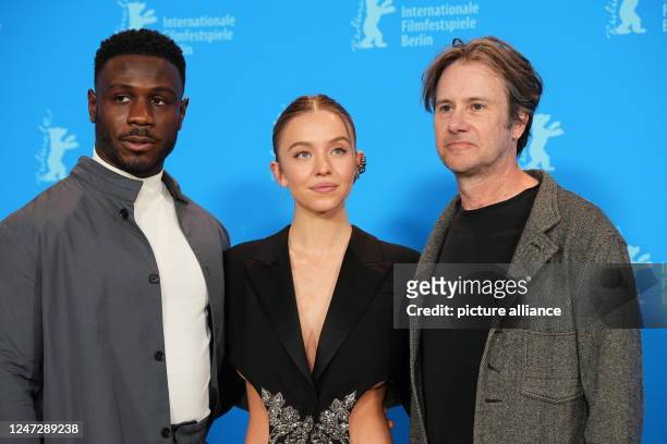 February 2023, Berlin: Actors Sydney Sweeney , Josh Hamilton and Marchant Davis stand next to each other during the photocall for the film "Reality"....