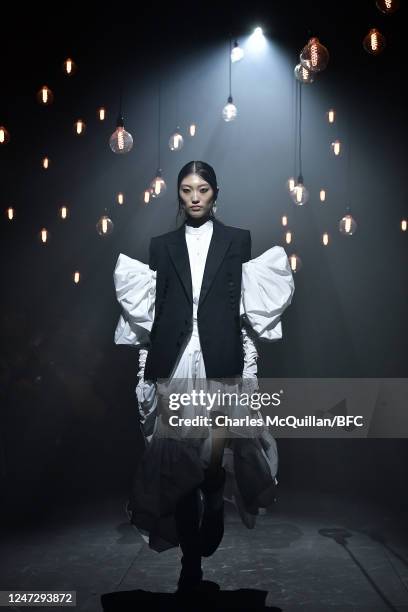 Model walks the runway at the Erdem show during London Fashion Week February 2023 on February 19, 2023 in London, England.