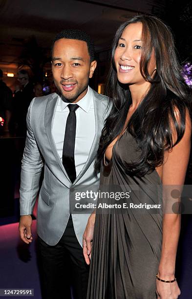 Musician John Legend and Susan Chong attend Cinema Against AIDS Toronto 2011 Benefiting amfAR And Dignitas at The Carlu Theatre on September 11, 2011...